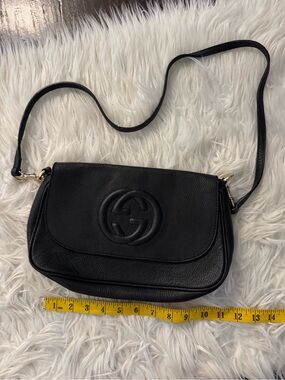 Gucci Black Pebbled Leather Shoulder Bag with Embossed Logo